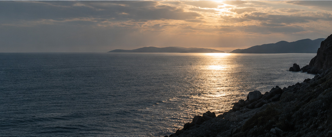 Sea beneath a quiet evening sky